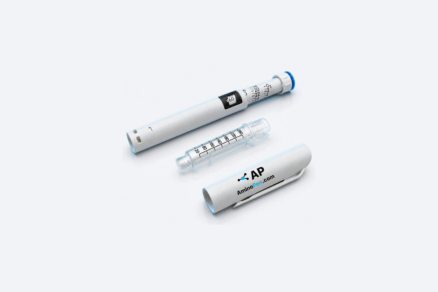 AminoPen Go disassembled, showing the white pen body, glass cartridge, and AP-logo cap