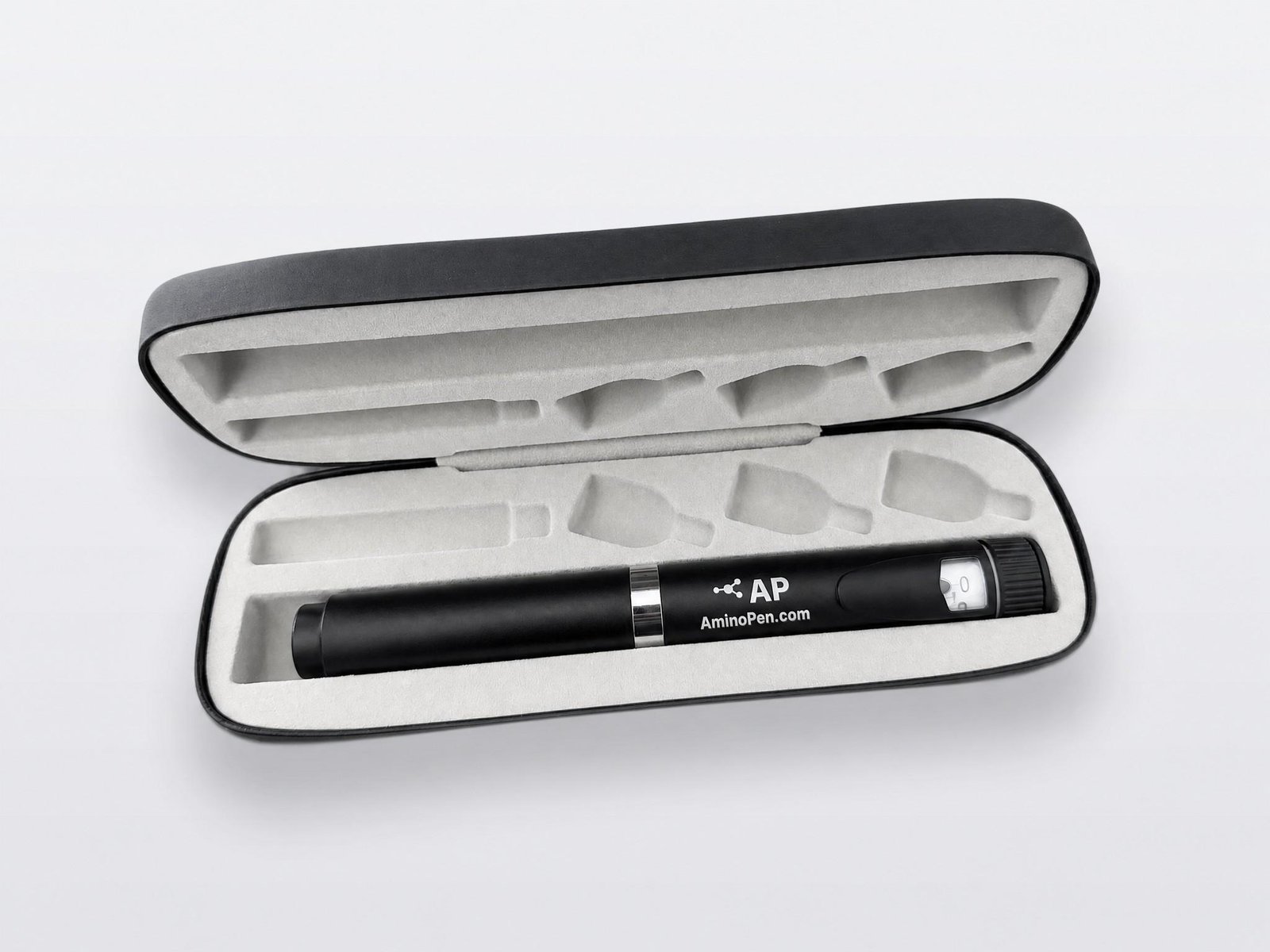 AminoPen Pro hardshell case, open, on a light gray ground